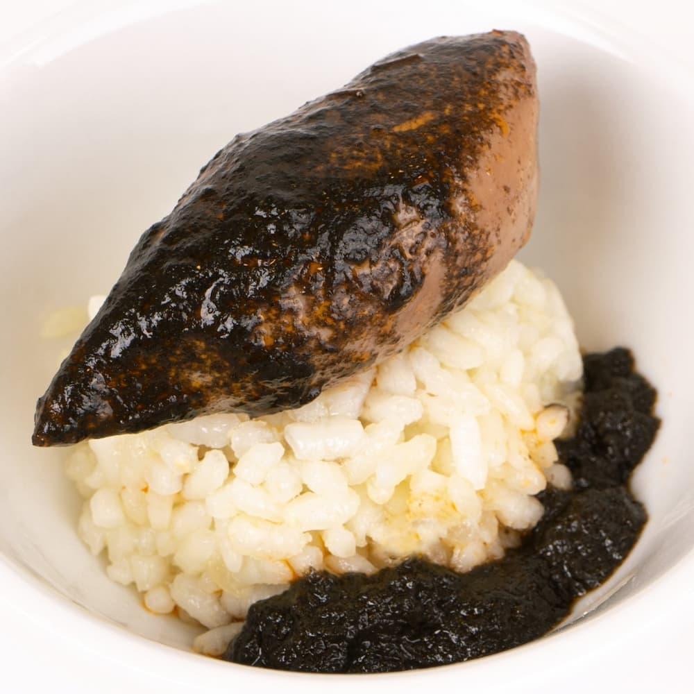 Chipirones in eigener Tinte (Kleine Tintenfische aus Galizien)